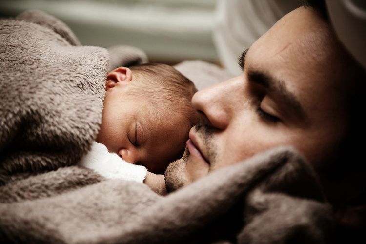 Father and child sleeping