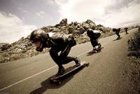 Downhill skateboarders